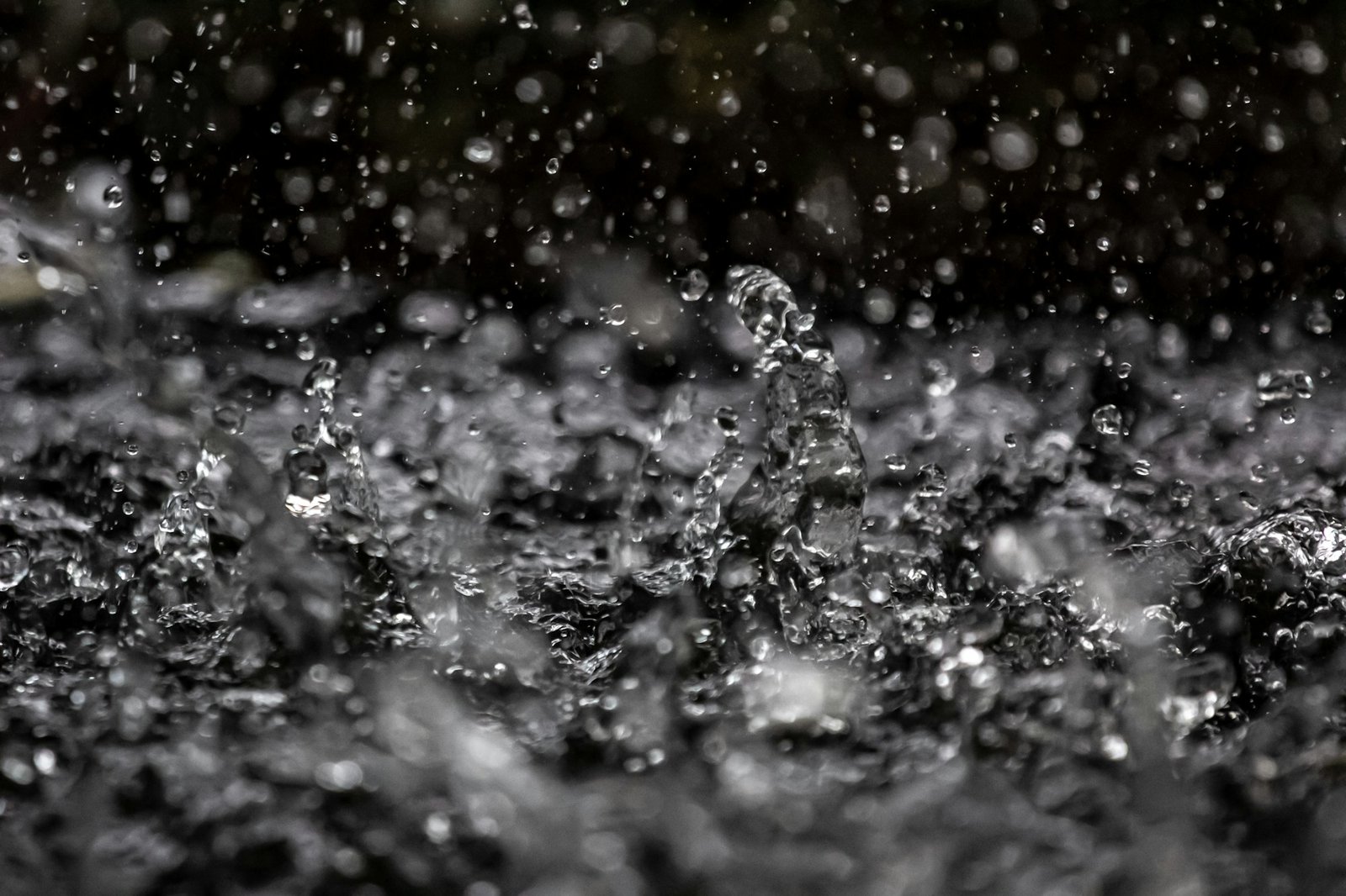 Close-up of heavy rain splashing on a surface